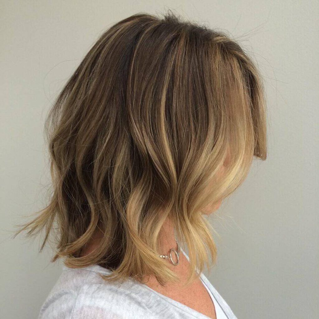 Strandachtige blonde balayage bob