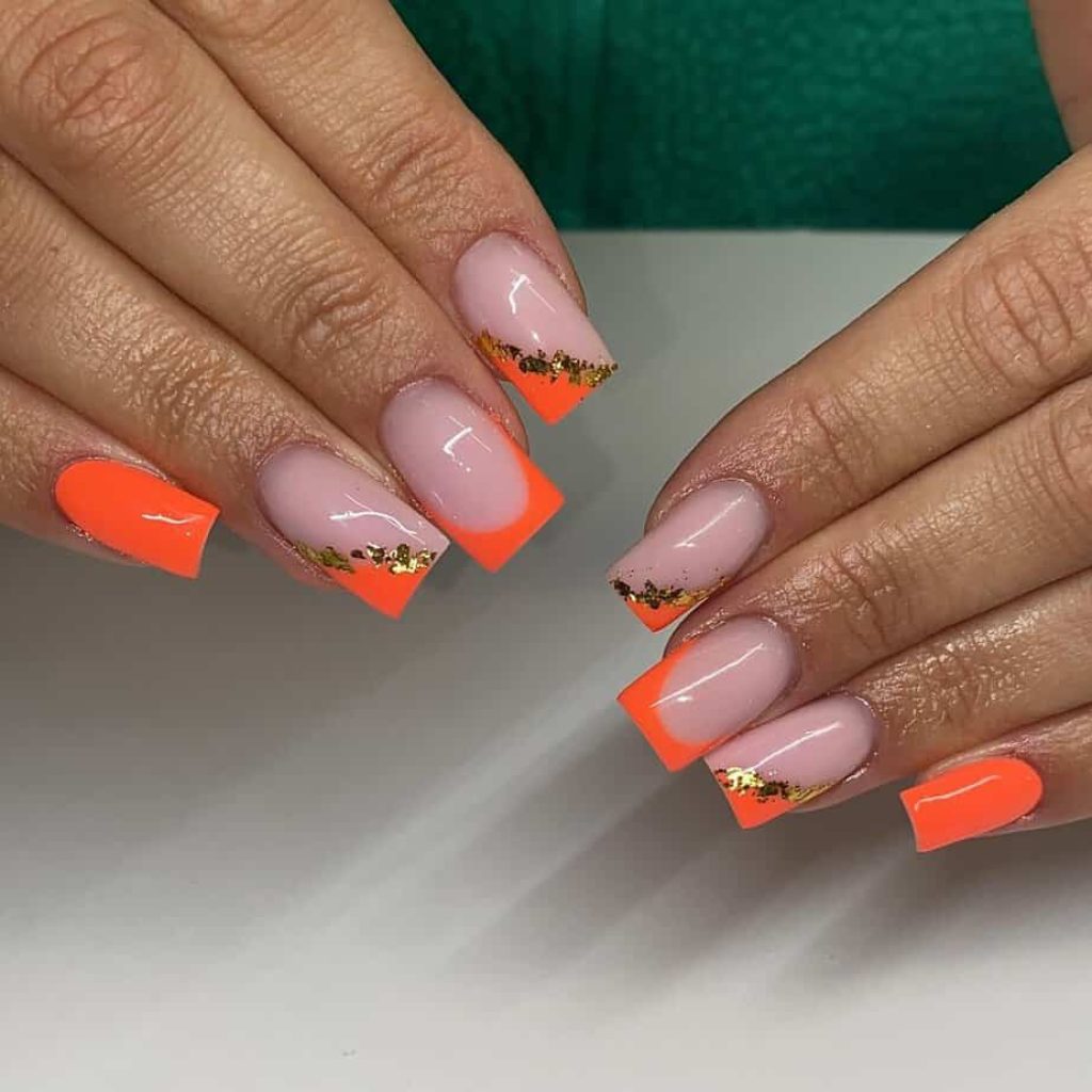 Gouden oranje nagels