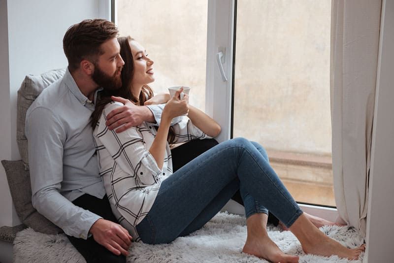couple sitting by the window