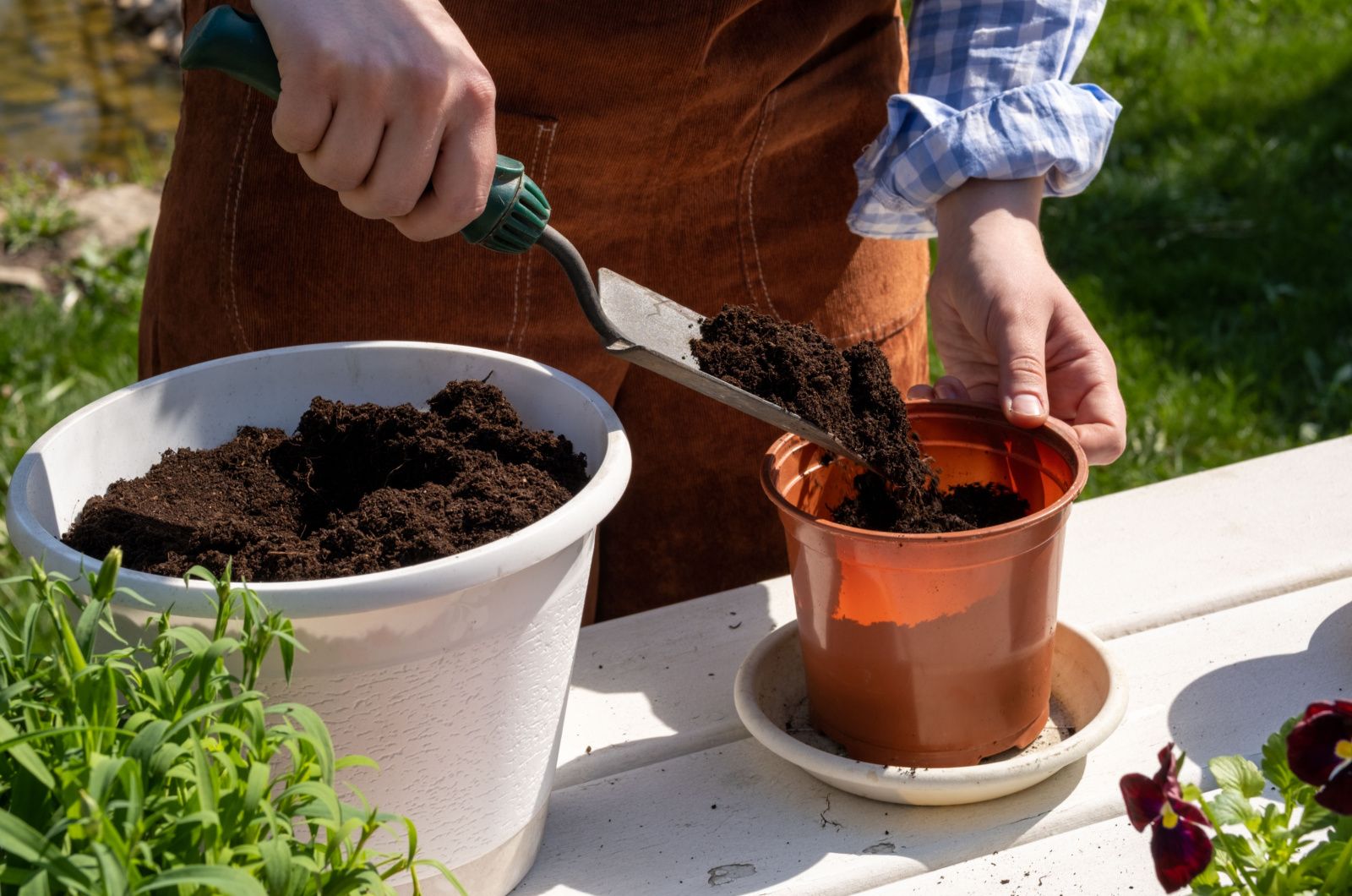 woman planting with reusable soil
