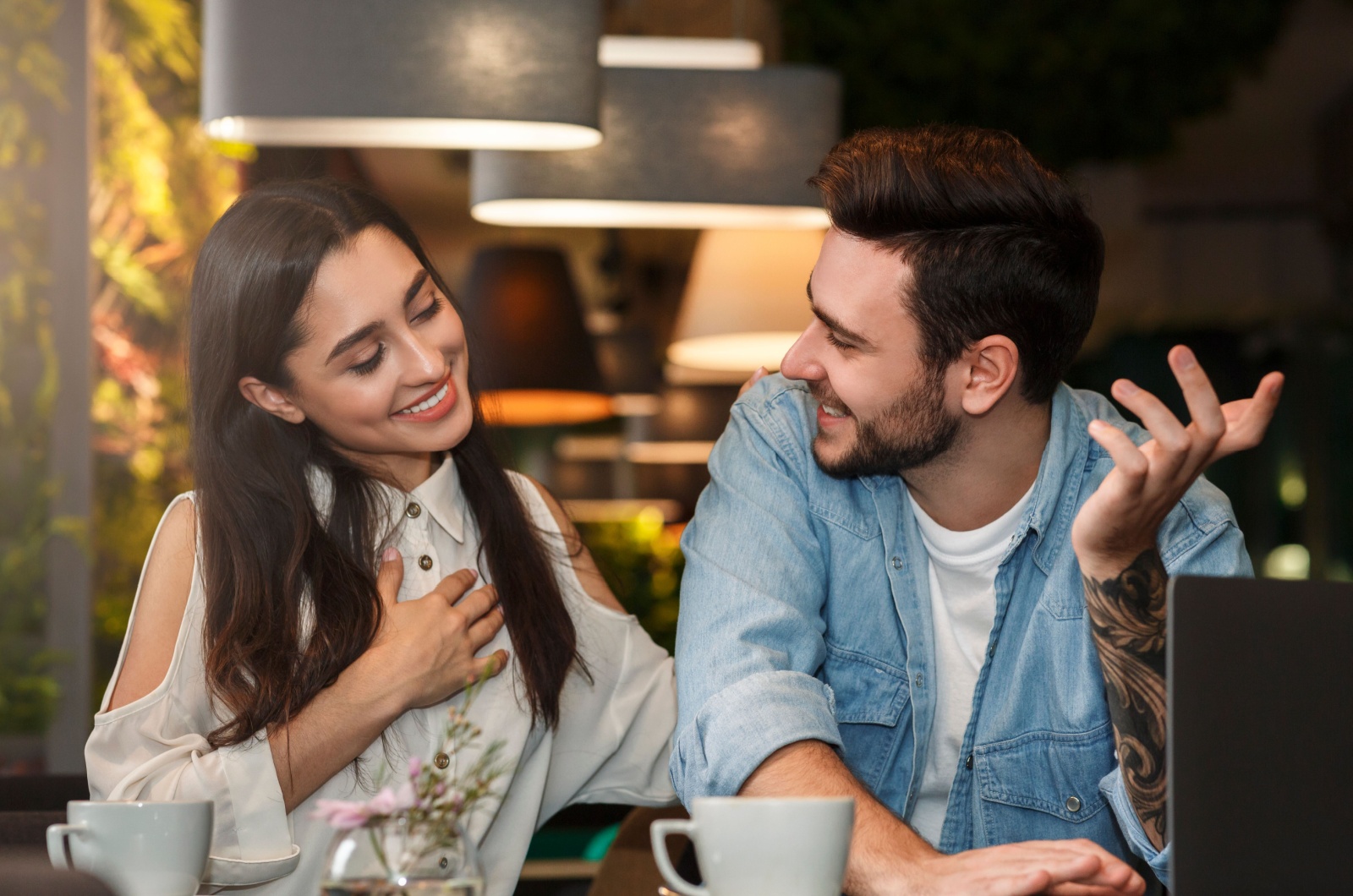 man and woman in a bar