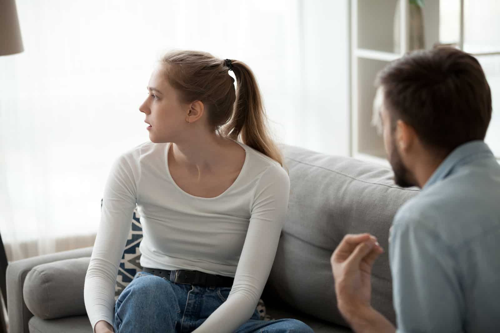 girlfriend turns away from angry boyfriend